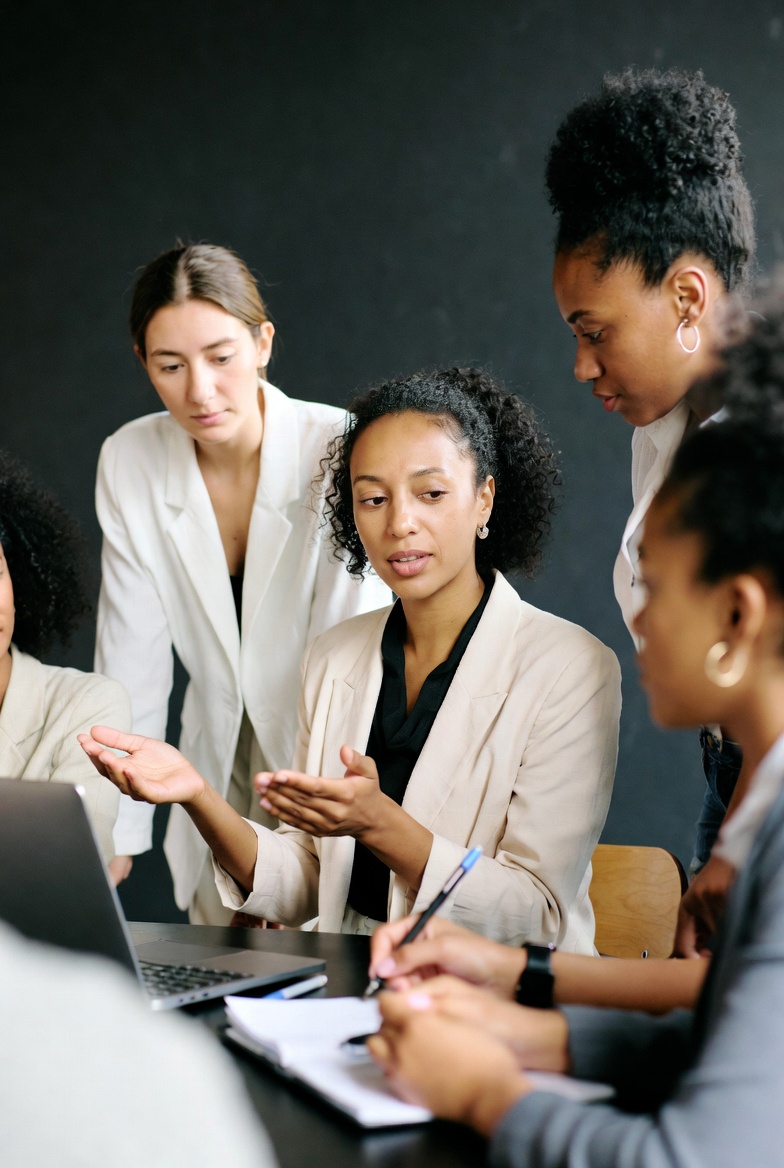 Women collaborating and sharing knowledge